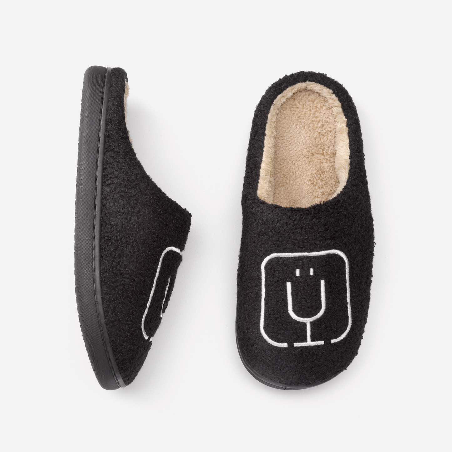 brumate-fuzzy-slippers-black-l4 apparel-slippers-above.png